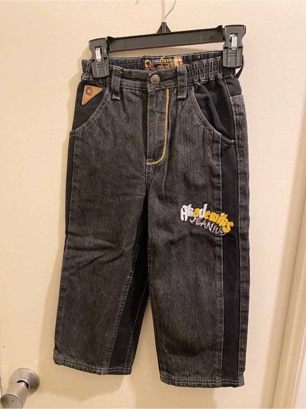 F) Akademiks Vintage Black Denim Jeans with Yellow Logo Accents